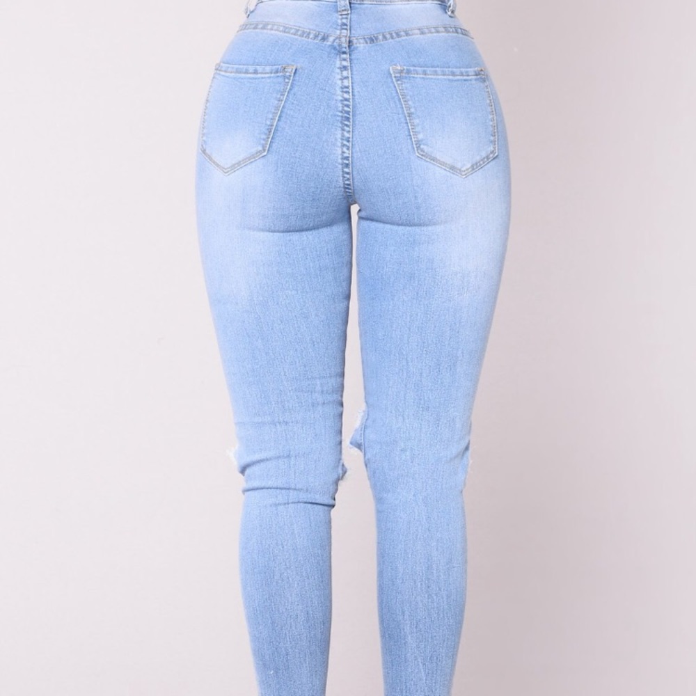 Fashion Nova “Blue Dream High Rise Jeans,”